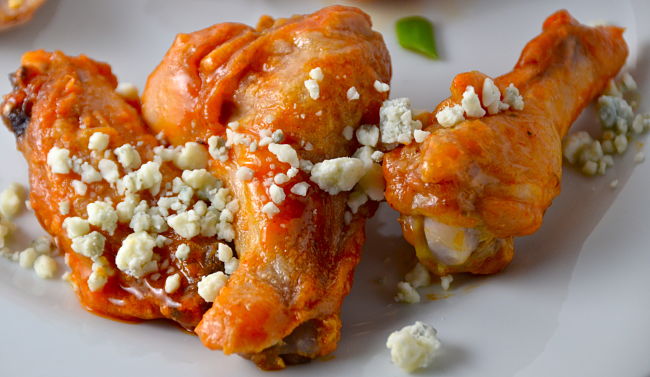 Lovely glazed chicken wings recipe sprinkled with feta cheese - a delightful combination