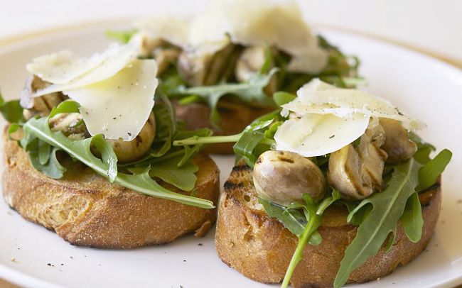 Mushroom Bruschetta with rocket and Parmesan Cheese flakes - see more recipes here