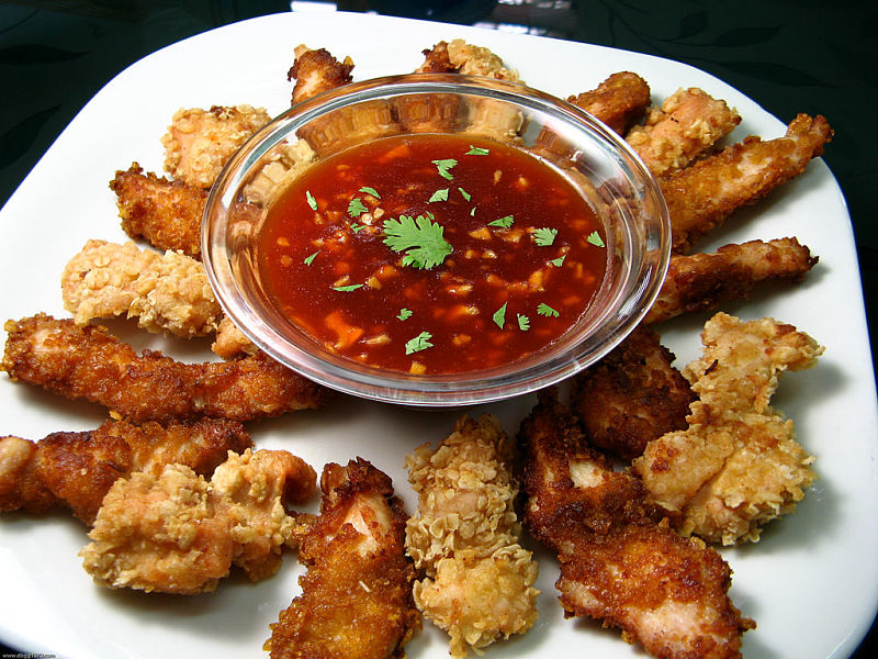 Perfect party food - chicken strips perfectly cooked with a delightful sauce for dipping.