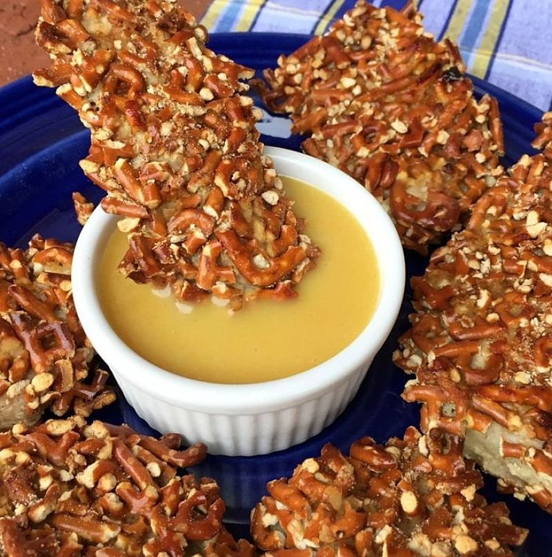 Chicken breast strips coated with 
  crushed pretzels and served with a delightful dipping sauce.