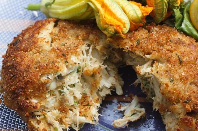 Crab cakes have a delightful texture and you can showcase vegetables as side dishes