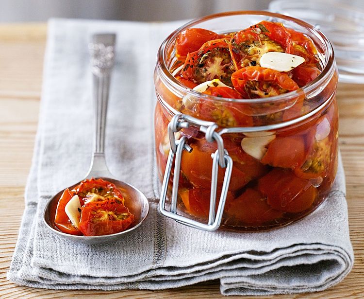 Lovely oven dried tomatoes and colorful, 
  delicious and have a lovely texture. See this article for simple ways to dry your own tomatoes on the oven