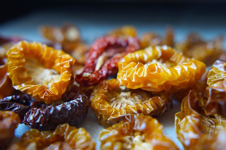 Use colored tomatoes and a range of varieties when drying tomatoes in your oven.