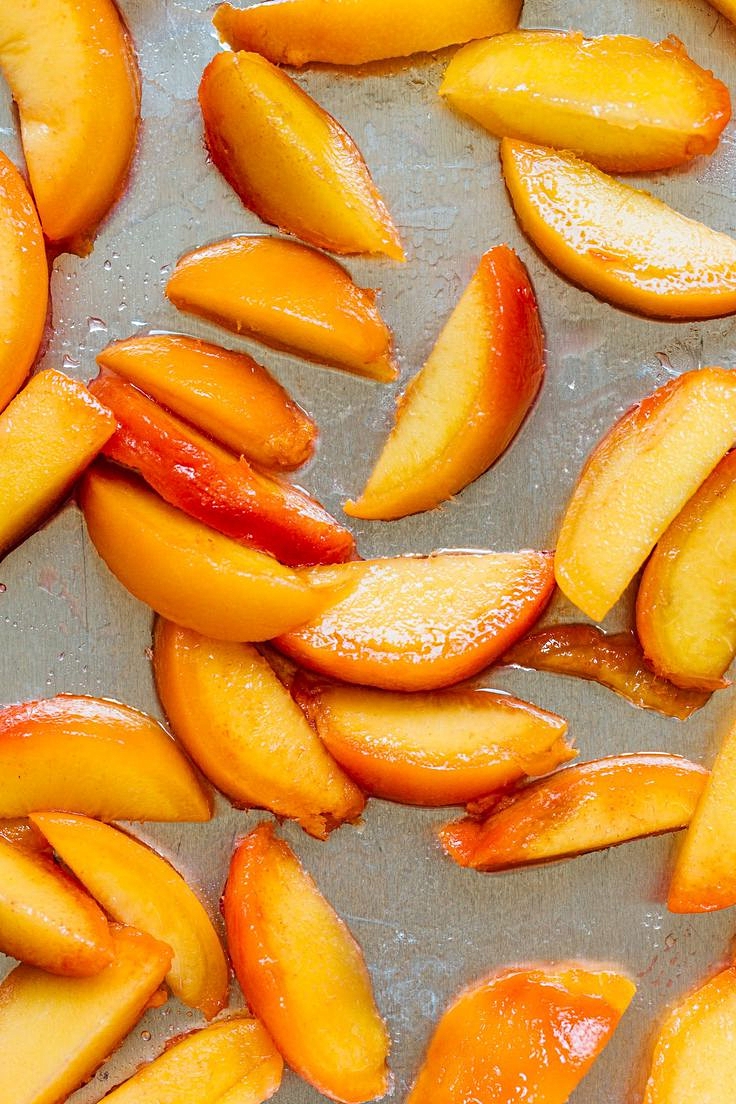 Fresh peaches - sliced and ready to freeze by placing well separated on trays