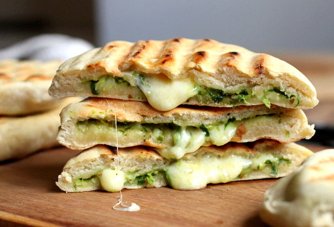 Lovely filled flatbread with cheese that melts and boosts the flavor - see the great collection fo recipes in this article