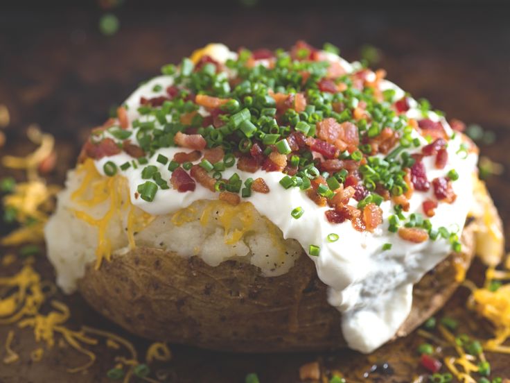 Perfect potato roasted in its jacket and stuffed with crispy bacon and cheese. Learn the secrets of roast potatoes here in this article