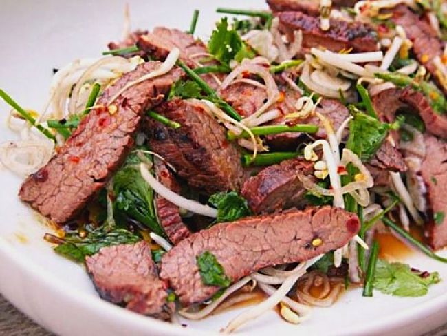 Grilled flank steak can be tender and full of flavor if it is marinated, seared and sliced thinly across the grain. Ideal for meal with salad and vegetable dishes. See many fabulous recipes to try.