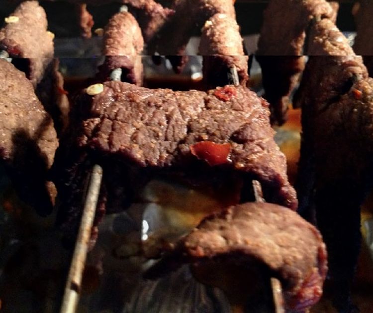 Marinated beef strips can be died over and open flame, in a barbecue or a smoker. Learn how here