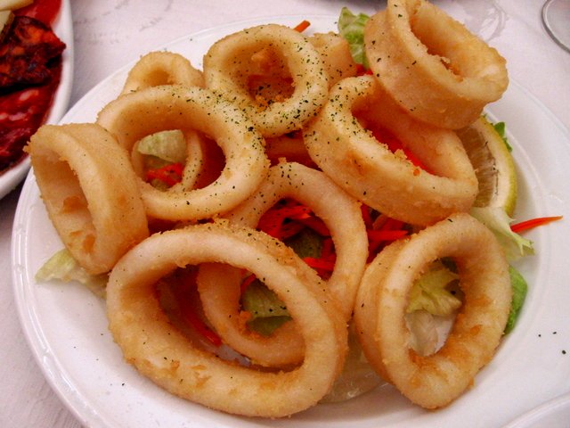 Spicy squid rings with cumin is a good example of the savory tastes available at tapas bars. You can easily make these dishes at home.