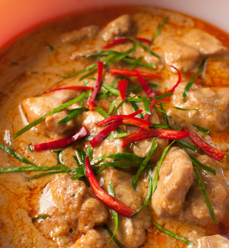 Try this delicious lighter chicken curry recipe with pureed tomatoes and almonds. You can vary the spices to suit your taste and add chillies when served for those guests who like hot curry 