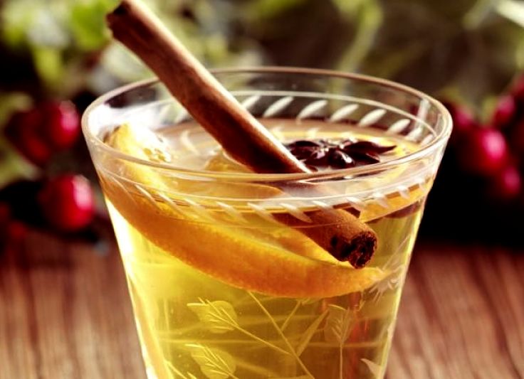 Warm mulled white wine makes a pleasant alternative spiked wine drink on cold winter days 