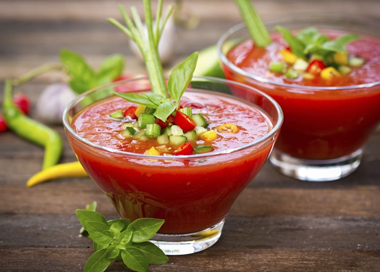 Delicious summer Gazpacho soup served in glass bowls