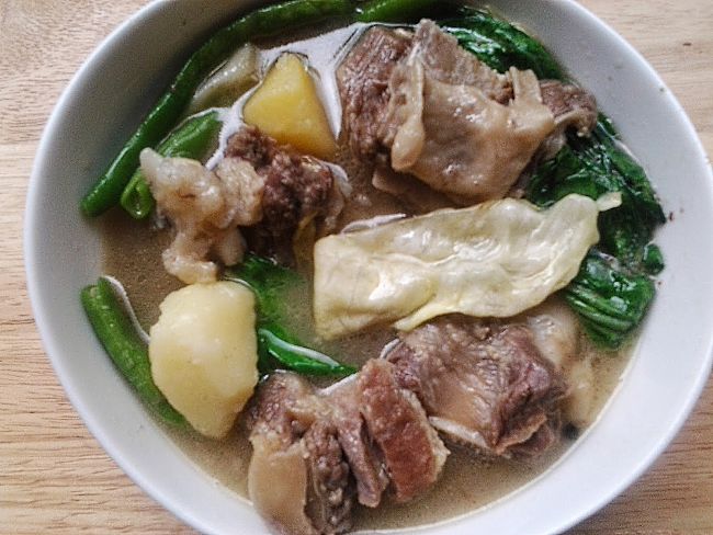 This Filipino dish consists of beef brisket or shank, potatoes, pechay, Baguio beans, cabbage and some seasoning. The meat should be tender and the vegetables not overcooked in a tasty broth.