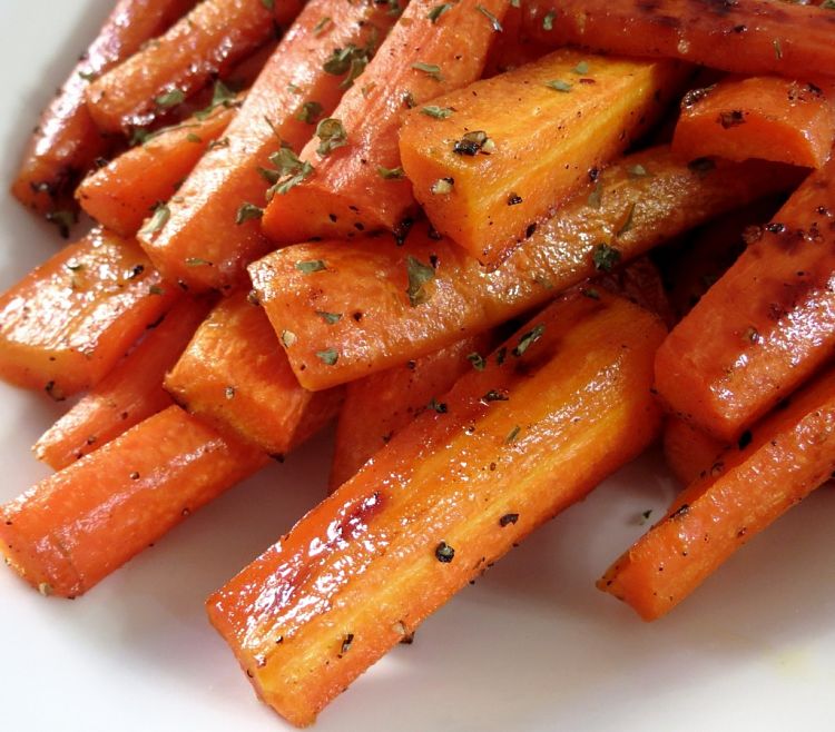 Baked honey carrots with herbs is a wonderful dish that showcases the color, texture and sweetness of carrots when cooked.