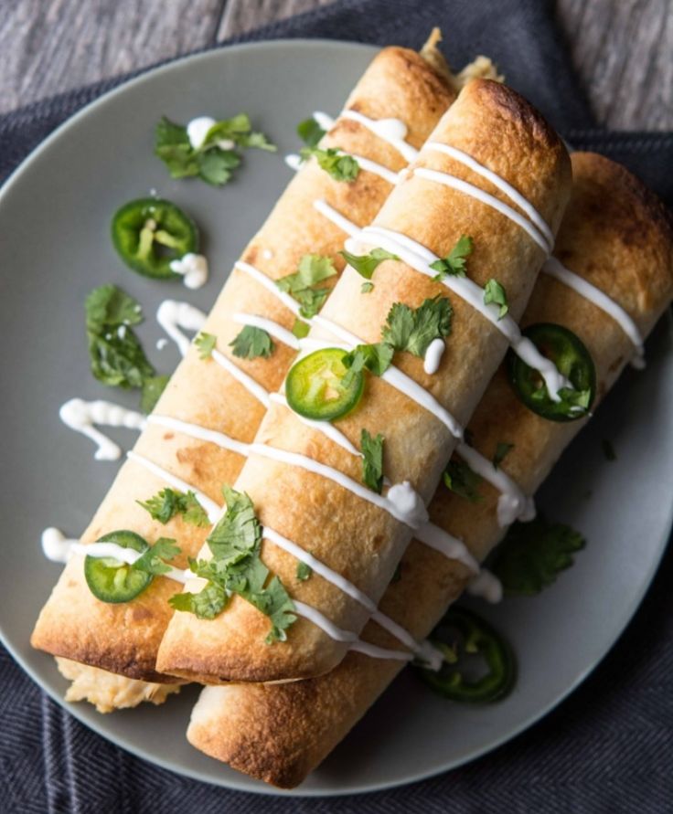 alapeno Pepper Chicken Flautas with sour cream drizzle and cilantro - a lovely treat
