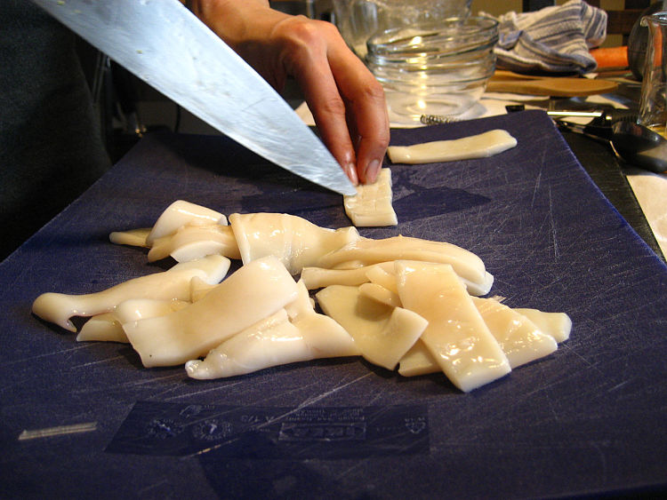 Scoring the squid properly before cooking is one of the secrets to perfect homemade Chinese fried squid 