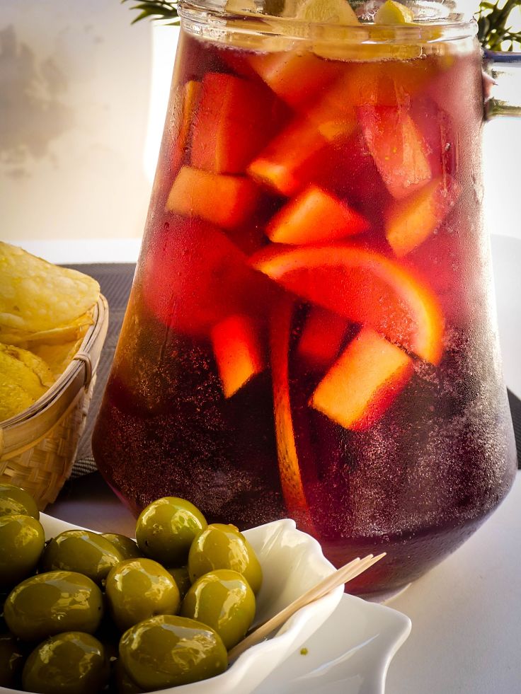 Homemade Fruit and Wine Sangria pairs so well with olives, cheese and anti-pasta ingredients.
