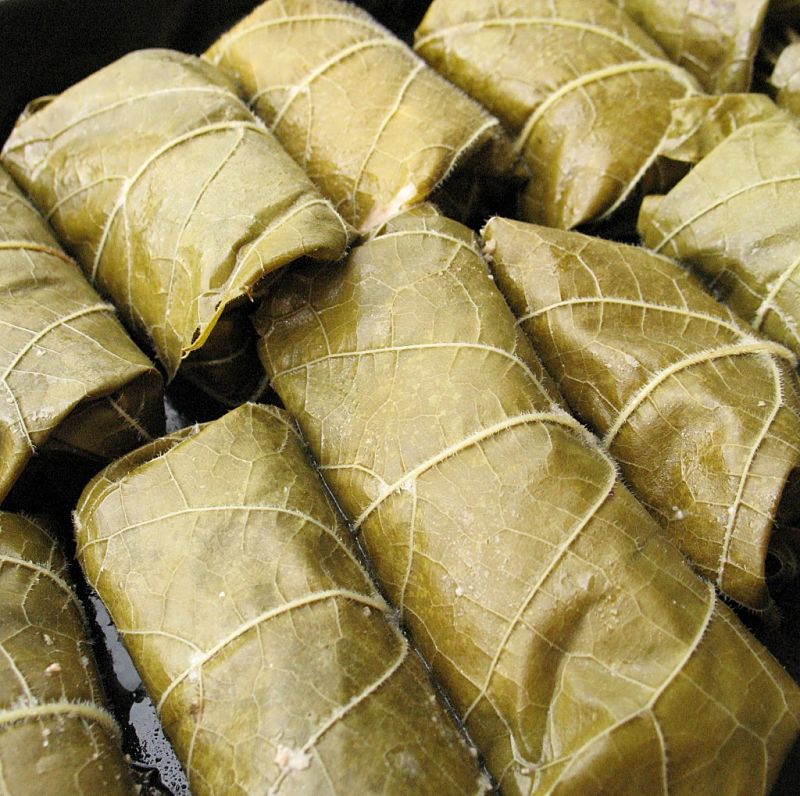 Stuffed vine leaves are cooked tightly packed together in a heavy pan to stop them unravelling.
