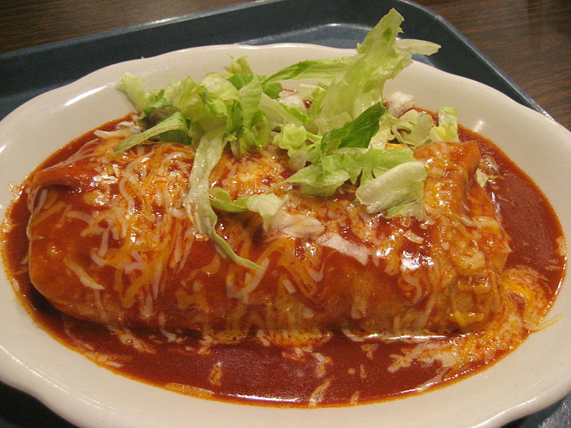 Wet Burritos with hot tomato salsa (homemade) and cheese