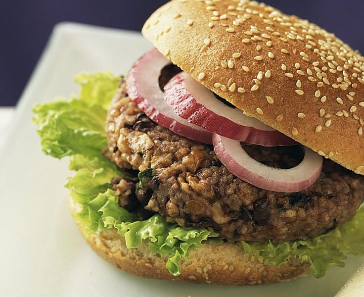 Onion rings and lettuce complement a delicious veggie patties - see more recipes here