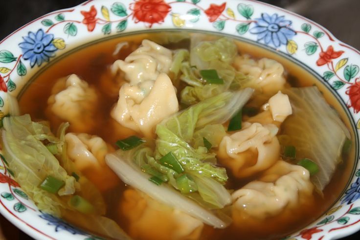 Cabbage and spring onion pairs very well with homemade wonton soup. Try one of the great recipes in this article