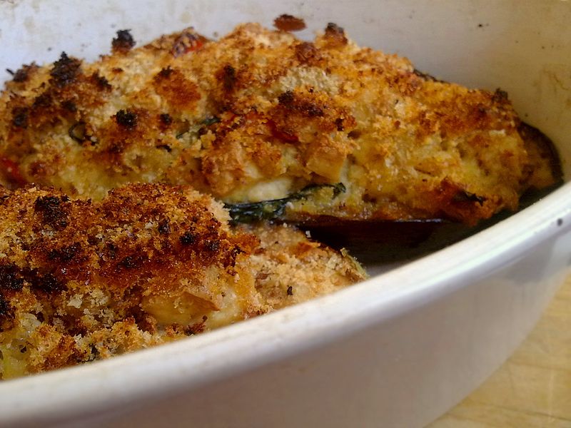 Topping eggplants with cheese and breadcrumbs provides a lovely counter to the softness of the eggplants and the filling